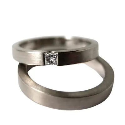 Argollas #55 · De inspiración, con diamante de 0.5 ct en oro — par de argollas de matrimonio, modelo A-24-1 — Joyería y Hechuras Rivera
